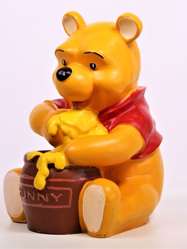 Winnie de Pooh met heerlijke honingpot